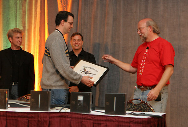 Tom Wheeler receives the NetBeans Community Award from James Gosling